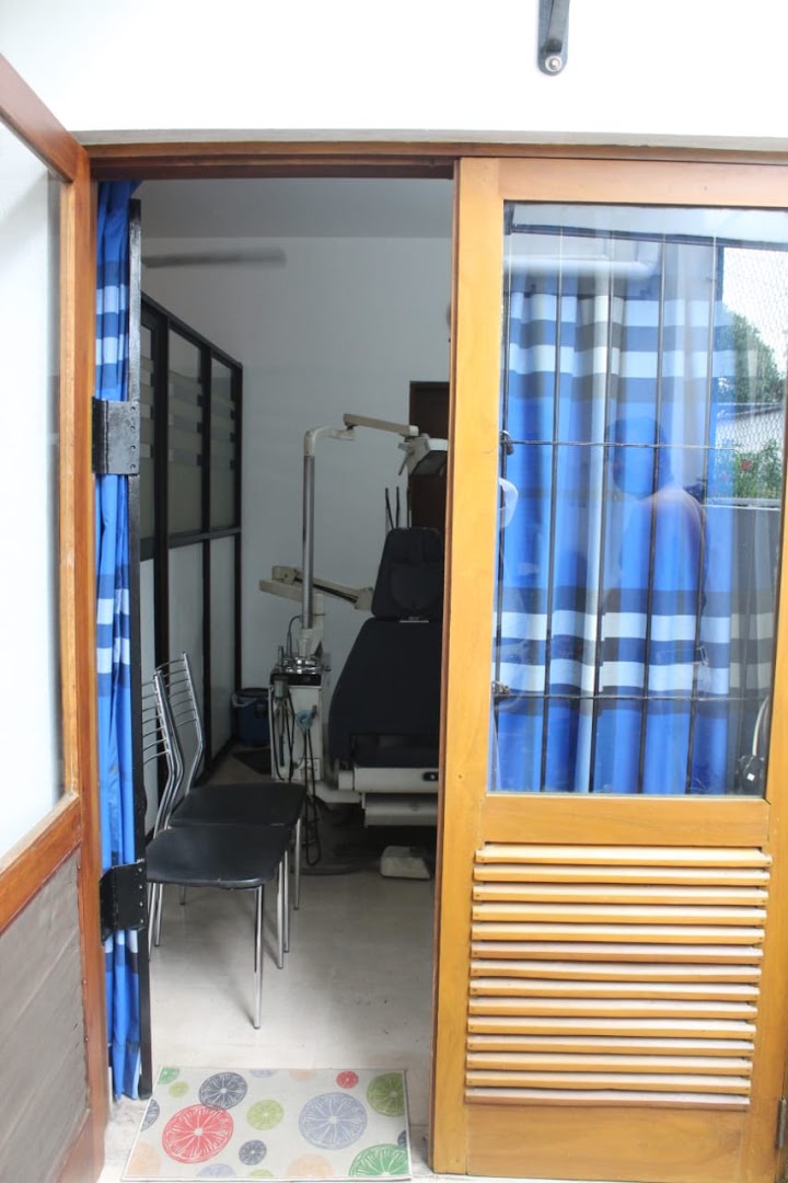 Wood framed entrance opening into the treatment room